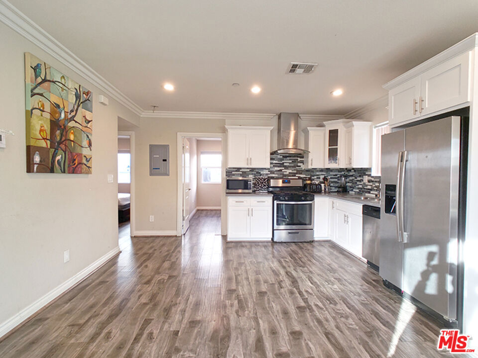JUST TO LUCKY ONES SEARCHING..... READY TO MOVE IN!! NEWER APARTMENT UNIT BUILT IN 2017. 2 BED 1 BATH & 2 PARKING SPACES. Washer and dryer is IN UNIT. The unit consists of WOOD LIKE LAMINATE FLOORS THOROUGHOUT. tiled bathrooms, contemporary fixtures, stainless steel appliances, central AIR CONDITIONER and CENTRAL HEATING, and quartz counter tops. The property is located near shops, restaurants, banks, freeway and entertainment. A must see!! You will love the layout of this unit!