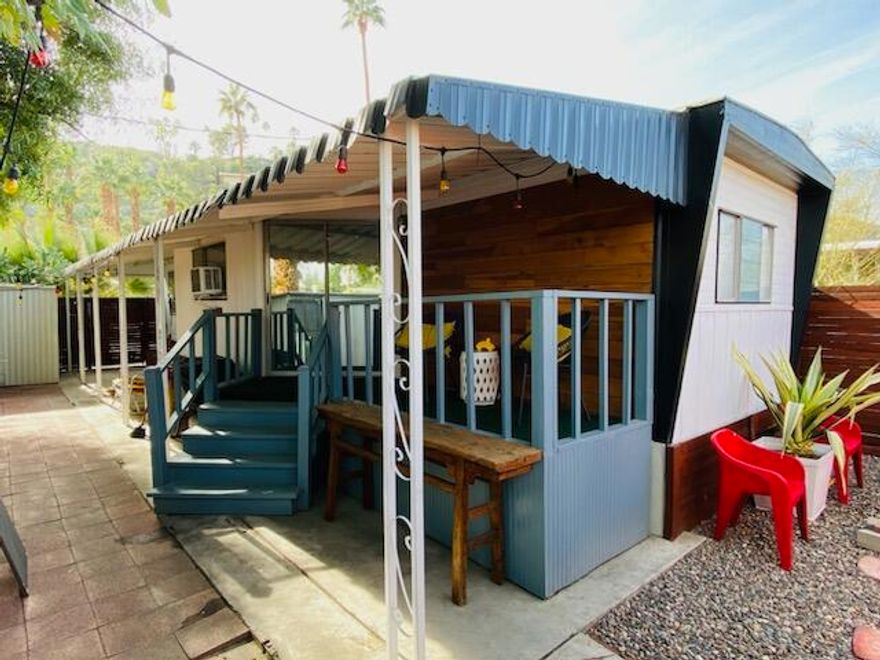 LOCATION, LOCATION.LOCATION, this mobile home is nestled under the Sata Rosa Mountains in south Palm Springs.  Horizon MH Village is an eclectic mobile home park and is centrally located between Smoketree Commons and Rockridge Shopping Plaza and is three miles from the Palm Springs International Airport.  Enjoy the well-maintained all-age community with great neighbors in a quiet, affordable secure location. Pet friendly enclosed dog park and virtually wind free. Amenities are Community Swimming Pool, Spa, Gym, Ping Pong Tables, Shuffleboard, and Hiking Trail to the iconic Bob Hope Estate and Araby Trail and much more.  This 1 Bedroom, 1 Bath mobile is a timeless Mid-century modern open floor plan and has had some renovations including newer laminate flooring throughout, newer roof, and a newer hot water heater, and the bathroom has been updated.  The Bedroom closets are cedar lined and there is a room air conditioner for the warm weather.  The kitchen has a breakfast bar with plenty of cabinets for storage. The living room is open to the kitchen with a mini split air conditioner. This mobile can be your forever home or your getaway home as it comes turnkey furnished.  It has a nice private patio and yard for entertaining or enjoying your morning coffee or evening wine. There are two sheds, one for storage and the other has a washer and dryer for your convenience.  There are two parking spaces at the rear of the mobile.  The land rent is currently $925 per month and includes water and trash.  Potential buyers must qualify to purchase with verifiable income of two times the land rent.  All information deemed reliable, buyer to verify.