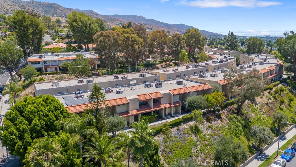 Set high in the Cabrini Villas, this beautifully updated 4-bedroom, 2.5-bath townhouse combines hillside privacy with modern comfort and incredible community amenities. The main level welcomes you with beautiful hardwood floors and a large open living and dining room area, perfect for hosting gatherings or simply enjoying the flow of everyday life. A cozy fireplace anchors the living space, while sliding doors open to a spacious private patio —an ideal spot for entertaining, morning coffee, or relaxing at sunset.
The updated kitchen features stainless steel appliances, modern cabinetry, and stylish countertops, making it as functional as it is inviting. Upstairs, you’ll find four generous bedrooms, including a primary suite with a large walk-in closet and its own en-suite bathroom. A second full bathroom upstairs conveniently serves the additional bedrooms, ensuring comfort for family and guests.
The home also includes the convenience of an attached two-car garage with a versatile bonus space that can flex as a home office, gym or storage room.
Life at Cabrini Villas means access to resort-style amenities: seven pools, four spas, saunas, six tennis courts, basketball and volleyball courts, playgrounds, and lush landscaped grounds. The HOA provides added ease by covering water, sewer, internet, cable, and landscaping.
All this just minutes from major freeways, Burbank’s studios, Downtown Burbank, shopping, and dining. A rare opportunity to enjoy hillside living with both space and community at your doorstep.