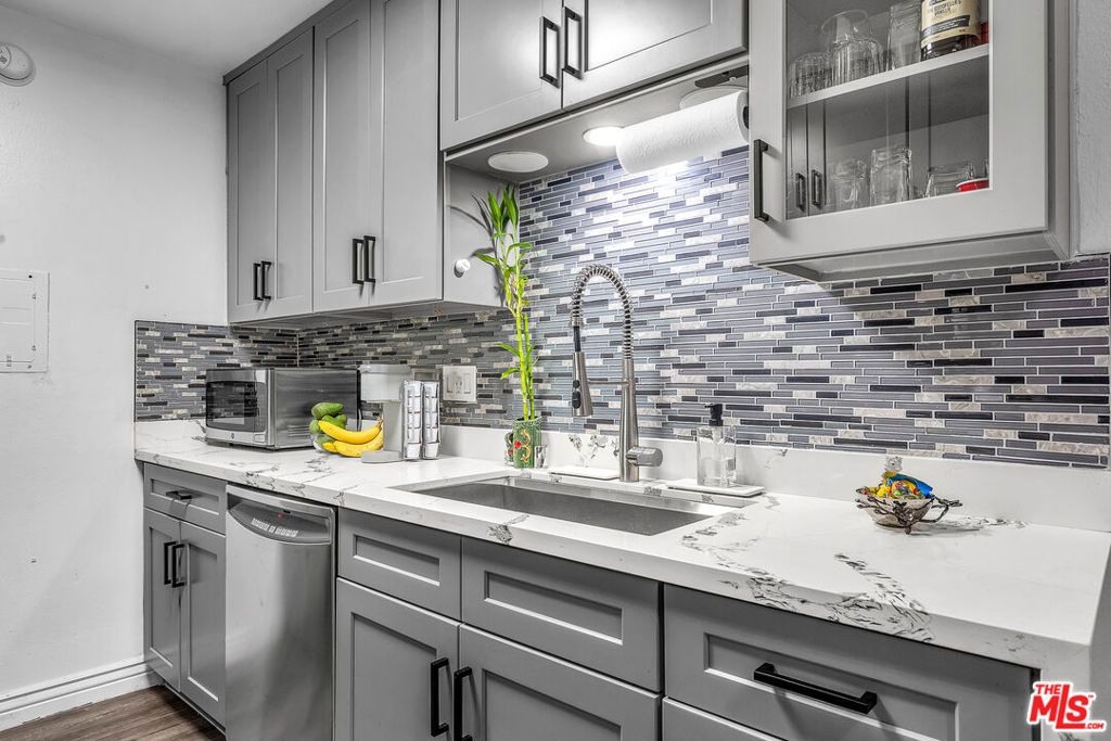 Photo of 5460 White Oak Avenue #D309, Encino, CA 91316 (MLS # 25533521)