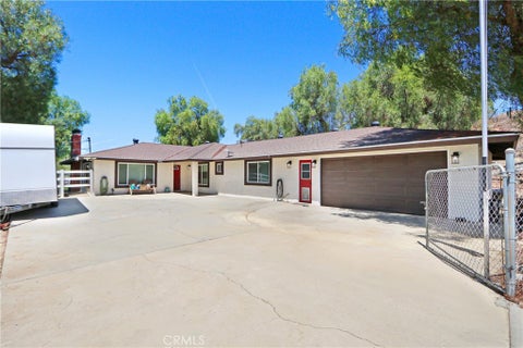 Photo of 16972 Mockingbird Canyon RD, Riverside, CA 92504 (MLS # IG26185414)