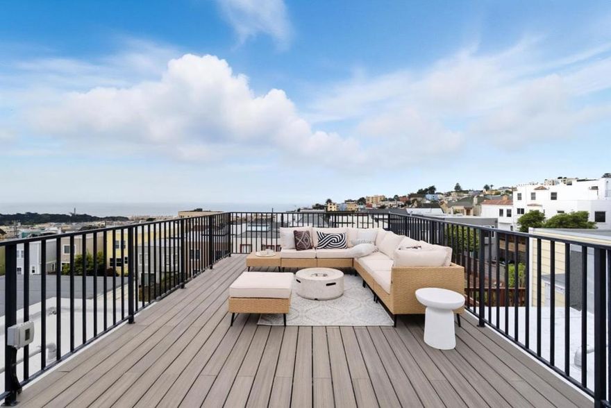 Perched in the heart of San Francisco's Outer Richmond, 651 41st Avenue is a rare residence that blends modern sophistication with coastal beauty. This contemporary single-family home has been reimagined to capture light, views, and comfort at every turn. At its crown, a 355 sqft rooftop deck offers sweeping vistas of Ocean Beach, Golden Gate Park, and the Marin Headlands, creating a stunning backdrop for entertaining or relaxing. Inside, skylights and expansive windows bathe the living spaces in natural light, while wide-plank floors and refined finishes add warmth. The chef's kitchen features a striking waterfall island, luxury appliances, and custom cabinetry that make daily living and hosting effortless. An open layout flows seamlessly to inviting living and dining areas, highlighted by an elegant electric fireplace. Bedrooms provide comfort and style, while updated bathrooms feature designer tile and sleek fixtures. Upgrades include a home Wi-Fi booster and a 240V EV charger outlet. Smart-home features, including Nest and Ring, further enhance ease and security. Just steps from the ocean, cafes, and shops, this home offers the perfect balance of modern design, coastal serenity, and city living- an unmatched opportunity in one of San Francisco's most desirable neighborhoods.