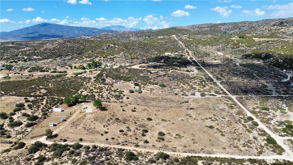 Looking for space, privacy, and a property ready for your vision? This 5.33-acre parcel in Anza offers the perfect balance of rural charm and modern convenience, making it an incredible opportunity for those looking to build a custom home, start a ranch, or create a weekend escape.
Set in a peaceful location with panoramic mountain views, this property provides a true country lifestyle while still being just a short drive to schools, local services, and nearby highway access. The land is mostly usable, giving you plenty of room for horses, livestock, gardens, or outdoor recreation.
Unlike many vacant parcels, this one already has essential improvements in place:
Electric available at the property
Private well for reliable water access
Propane available for easy off-grid living or future home use
Two concrete pads already laid out, perfect for storage, building, or staging future projects
Zoned R-R (Rural Residential), the property offers excellent flexibility for a variety of uses including equestrian facilities, small-scale agriculture, or a private homestead. And with no HOA restrictions, you’ll have the freedom to design the property exactly the way you want.
The surrounding area is known for its beautiful natural landscapes, star-filled skies, and welcoming community atmosphere. Whether you’re drawn to the outdoor lifestyle, looking for a retreat from the city, or planning your dream ranch, this property provides the space and infrastructure to bring those plans to life.
Don’t miss your chance to own a piece of Anza’s tranquil countryside with utilities and improvements already in place. Opportunities like this don’t come often—schedule a showing today and start building your future!