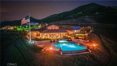 Photo of 30635 Sorrel Lane, Canyon Lake, CA 92587 (MLS # SW26024638)