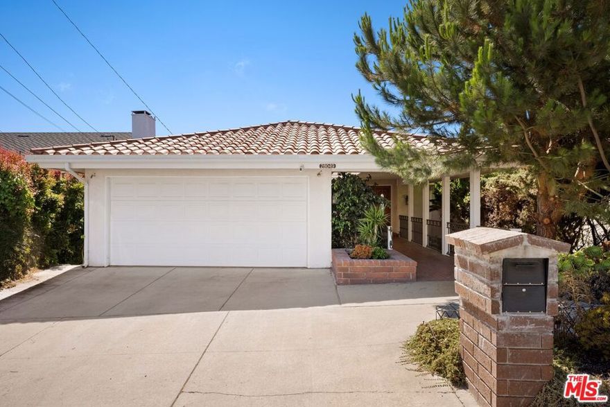 Welcome to 28049 Lobrook Drive, where breathtaking ocean vistas stretch from Catalina to Malibu on every floor. Tucked along a tranquil street in the heart of the Los Verdes neighborhood of Rancho Palos Verdes, this spacious home epitomizes coastal living, with a seamless indoor-outdoor flow. Sited on an expansive 11000+ square foot lot, this 4-bedroom, 5-bathroom residence boasts three thoughtfully designed levels. The street level entry into the light-filled living room, framed by oversized windows, captures the panoramic views of the Pacific, the Queen's Necklace, and beyond. The kitchen, with ocean views, is on the same level and is anchored by a dramatic granite island. Outfitted with premium appliances - Sub-Zero, Viking, Thermador, and Bosch, it's tailor-made for everything from casual mornings to elegant entertaining. Adjacent formal dining and living rooms open to a sprawling deck, an idyllic perch for al fresco dining or sunset lounging. One floor below, you enter into the ocean-facing primary suite, offering a peaceful, mid-level retreat with direct access to the 2nd story deck, spa-like bath, and adjacent bedrooms and bathrooms. The lower level offers an expansive family room and potential to add a kitchenette and more, providing added flexibility for gatherings, guests, or work-from-home living. Sliding glass doors open directly to the wood deck and outdoor area with views. With its extraordinary scale, seamless flow, and uninterrupted panoramic ocean views from every level, this home offers a rare combination of gracious living and a front-row seat to the Pacific - an exceptional coastal experience from top to bottom.