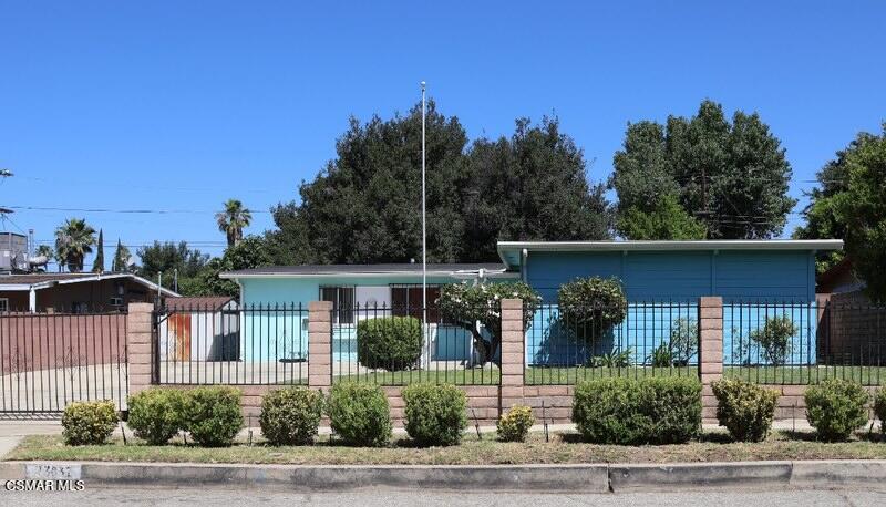 Opportunity knocks! Welcome to a 3-bedroom, 2-bathroom home nestled on a generous 7,524 sq ft lot. With 1,044 sq ft of living space, this home features a functional layout with a spacious living area, a dedicated dining space, and a kitchen with plenty of cabinet storage. The primary bedroom includes its own private bathroom, and all three bedrooms offer good natural light and comfort.The backyard is generous in size--ideal for weekend gatherings, gardening, or even expanding the living space. A detached garage and gated driveway offer flexibility, privacy, and potential for an ADU (buyer to verify).Located on a residential street, close to schools, parks, shopping, and freeway access, this property has the essentials you need--and the potential to make it your own. Don't miss this chance to build equity and create your future home--schedule a private tour today!