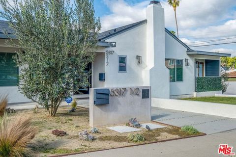 Photo of 5317 Valley Ridge Avenue, Los Angeles, CA 90043 (MLS # 26656295)