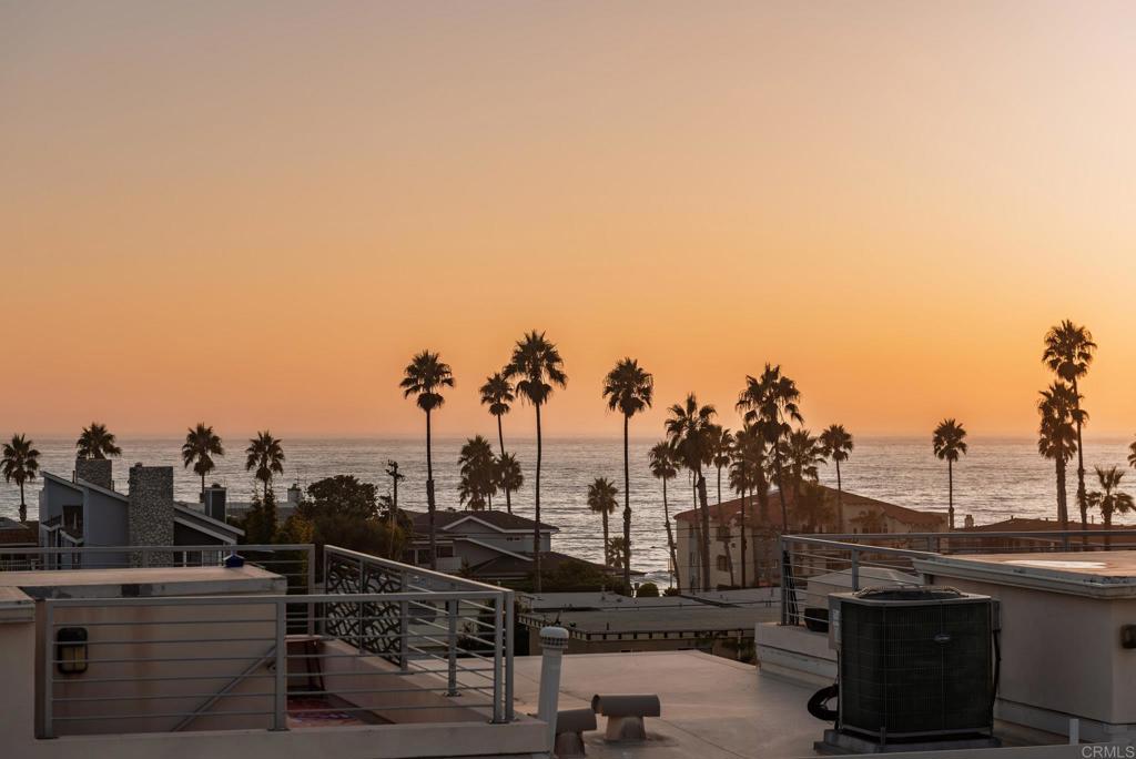 Just steps from the beach, this Oceanside retreat offers 360° rooftop views and proven VRBO rental income. Enjoy water views from La Jolla to the Oceanside Pier, plus snowcapped mountains to the east in winter. The open-concept gourmet kitchen features quartz countertops, Jenn-Air stainless appliances, and white Thermafoil self-closing cabinetry, flowing into a bright living room, dining area, and balcony for coastal breezes. Upstairs, two spacious master suites include stylish ensuite baths with upgraded tile and quartz counters. Additional highlights: an oversized attached garage, luxury vinyl plank flooring, plantation shutters, designer fans, and built in surround sound. Ideally located within walking distance to coffee shops, Oceanside transit center, restaurants, retail, and the pier, with scenic walking/biking trails connecting Oceanside and Carlsbad. Sold furnished (with exclusions). Situated in a quiet train zone, this sunny Southern California retreat truly has it all! Let us welcome you home today!
