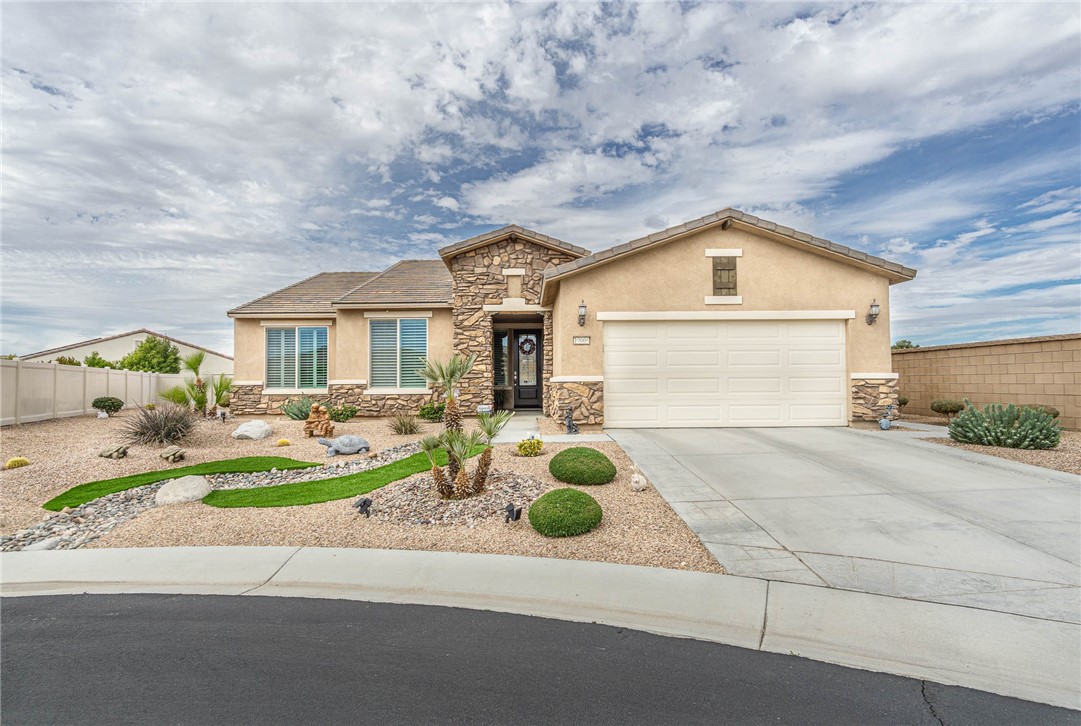 WELCOME TO 19006 CASSIA CT, APPLE VALLEY. AN EXCLUSIVE GATED COMMUNITY AT JESSE RANCH. THIS RESIDENCE DEFINES ELEGANCE , CLASS AND SOPHISTICATION. THE DEFINITION OF IMMACULATE. THERE IS NOTHING AVERAGE ABOUT THIS THREE BEDROOM AND T BATHS HOME. UPGRADES ARE FROM FLLORS TO CEILINGS. A NESTLED CUL-DE SAC THAT SITS ON A HUGH LOT THAN CAN EASILY ACCOMMODATE A POOL AND EVEN YOUR OWN MINIATURE GOLF PATH. THIS HOME WALKS IT'S WALK AND TALKS IT'S TALK. NO STONE LEFT UNTURNED. THE ENTRANCE IS MESMERIZING AND GRAND. THE FRONT AND REAR YARD IS PROFESSIONALLY LANDSCAPED. STEP INSIDE THE FOYER AND LOOK UP! YOUR OVERHEAD CEILINGS ARE CROWNED WITH ITS UNUQUE ARCHITECTURAL DESIGNS,DRAPED IN BOLD CROWN MOLDINGS. THE HOME IS OCCUPIED BY THE ORIGINAL OWNERS SINCE 2015. NO EXAGGERATION, THE TRUE DEFINITION OF IMPECCABLE AND PRIDE OF OWNERSHIP. MONEY WELL SPENT SPENT ON THE FINEST UPGRADES. INCLUDING SOLID HARDWOOD FLOORING AT A ACOST OF $20,000. THE MAJESTIC OVERSIZED ISLAND AND WARM GOURMET KITCHEN IS DRAPED IN FINE GRANIT WITH SEATING TO ACCOMMODATE SEVERAL GUESTS. ACROSS IS THE OPEN ELEGANT, ALL IN ONE GREAT ROOM/LIVING ROOM. ADJACENT IS YOUR SEPARATE FORMAL DINING AREA. A VERY TASTEFUL WALK-IN PANTRY. KITCHEN CABINETS ARE UPGRADED WITH SOLID HARDWOOD. NO EXPENSE SPARED THROUGHOUT THIS HOME. EVERY DOOR TO EACH ARE IS UP-GRADED TO REFLECT THE QUALITY OF THE RESIDENCE. THE MAIN ENTRY DOOR SPEAKS VOLUME. THE MASTER BEDROOM IS GRAND WITH ITS UNIQUE DESIGN OVER-HEAD CROWN MOLING. THE WALK- IN CLOSET IS MORE LIKE A LIVE- IN CLOSET, VERY SPACIOUS. LAUNDRY HAS ITS OWN ROOM WITH UTILITY SINK. QUALITY CEILING FANS IN EACH AREA OF THE RESIDENCE, TO HELP WITH YOUR ENERGY CONSERVATION AND RELAXATION. NOT ALL SHUTTERS ARE CREATED EQUAL THEREFORE, THESE ARE YOUR BEST QUALITY THAT GRACES ALL MAIN WINDOWS AND DOOR, LEADING TO THE LENAI/PATIO. LENAI/OUT-DOOR PATIO IS MADE FROM PURE ALUMINUM WOOD MATERIAL. TRANSLATION, WATER PROOF AND WILL NOT RUST. PATIO HAS BEEN EXTENDED TO ACCOMMODATE AND HOST LOTS OF GUESTS FOR LEISURE/ENTERTAINMENT. THE WELL KEPT OVERSIZED GARAGE HAS BEEN EXTENDED AN ADDITIONAL 10 FT. WITH LOTS OF STORAGE SPACE. THE CURB IS QUITE APPEALING. QUITE POSSIBLE THE BEST LOCATION AND BEST HOME IN THE AREA. THIS IS A DESIGNERS ORIGINAL THAT CANNOT BE DUPLICATED. LOOK ONCE YOU WILL NEVER THINK TWICE. EVERY ANGLE AND AREA ARE MAIN FOCAL POINT. THE COMMUNITY HAS 2 SPAS, 4 POOLS AND A CLUB HOSUE WITH 24 HOURS SECURITY. THE BEAUTY WILL BE IN THE EYE OF THE BEHOLDER