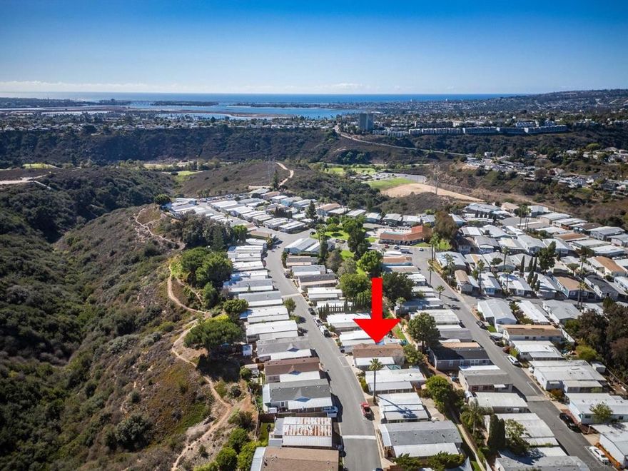 Welcome to this charming and updated manufactured home nestled in the heart of San Diego’s Linda Vista neighborhood. Featuring 3 bedrooms, 2 bathrooms, and 1,260 sq. ft. of comfortable living space, this home offers a spacious primary suite with a private bath, plus modern conveniences including a washer/dryer, refrigerator, microwave, backyard, and two covered carport spaces.  With quick access to major freeways, commuting is effortless—while still enjoying the comfort of a peaceful community setting. Linda Vista Village is ideally located near shopping, downtown, beaches, Balboa Park, and more.  Community amenities include a pool, spa, clubhouse, billiards game room, small library, and two laundry facilities. Space rent includes water and trash.
