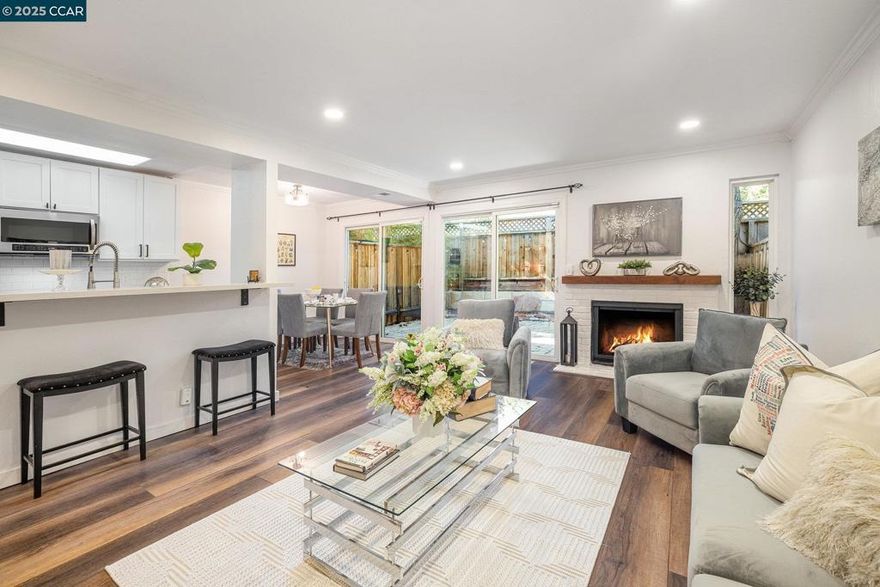 Beautifully Updated Walnut Forest Townhome. Stylish and light filled 2 bedroom, 2.5 bath home featuring an upgraded kitchen with stone countertops, stainless appliances, and white cabinetry. Large living area offers fresh paint, recessed lighting, dual sliders, and a cozy fireplace. Upstairs bedrooms are spacious with ample storage and modern finishes. Enjoy a private patio, plus community amenities including a pool, clubhouse, and Iron Horse Trail access. Conveniently located near top rated schools, The Livery, parks, shops, and freeway access.