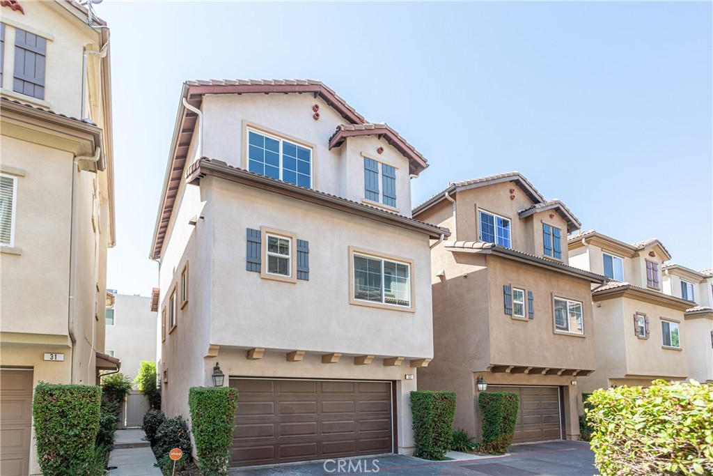 Welcome to this rare detached 3-level townhome offering 4 bedrooms and 4 bathrooms with a spacious, flexible layout perfect for modern living.
The first level includes a private bedroom with its own full bathroom and direct access to the outdoor patio which is ideal for guests, in-laws, or a home office. On the second level, you’ll find a bright and airy open floor plan where the living and dining areas flow seamlessly into the kitchen, creating the perfect space for entertaining. The kitchen features ample cabinetry, tile counters, and a gas range. A second bedroom with ensuite bathroom completes this level. The top floor boasts two generously sized bedrooms, each with its own ensuite bathroom, along with a convenient side-by-side laundry area.
Additional highlights include an attached 2-car garage with direct access and plenty of storage, fresh interior paint, and brand-new carpet throughout. This home is move-in ready and provides the privacy of a standalone residence with the convenience of townhome living. Located in a beautifully maintained community close to shopping, dining, schools, and freeway access, this home offers both comfort and convenience.