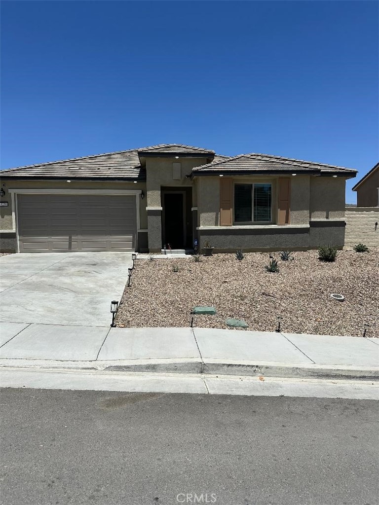 Why buy new when you can purchase this very upgraded home for less!!!! Must see. Beautiful inside. Three bedroom (with a flex room that can be used as a fourth bedroom or an office) two and a half bathroom single story home. Upon entry you notice the beauty with the LVP flooring, upgraded walls and a long dramatic entry hall. Walk down the hallway to the family great room. Open floor plan with the attached kitchen. This kitchen has many upgrades with a large single sink, pull out trash, walk in pantry, wall oven and microwave, large stovetop and stone counters. Right off the kitchen is space for a table and chairs for gatherings. The primary bed room has a large walk in closet and an on suite bath with double sinks and lots of counter space. Two additional bed rooms each have walk in closets. All bedrooms, flex space and living room keep the air moving with ceiling fans. There is also a powder room for guests. Nice size indoor laundry room includes a utility sink for convenience. Two car attached garage. Nice sized back yard with a covered patio area to relax. But thats not all! This house is equipped with solar panels AND a power bank to keep the solar you produce and keep the utility bills low!! Add this home to your list to view!!!