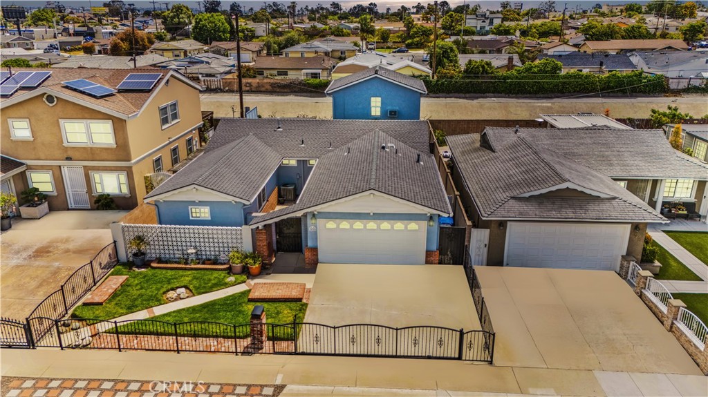Welcome to 20908 New Hampshire Avenue, Torrance! This spacious and well-maintained home features 4 bedrooms and 2 bathrooms with 2,198 sq. ft. of living space on a 5,064 sq. ft. lot. Three bedrooms and two full bathrooms are conveniently located on the main floor, offering comfortable and accessible living for family and guests. Enjoy a bright open layout with a large family room and separate dining area — perfect for everyday living and entertaining. The kitchen is a chef’s delight with a central island, gas stove and oven, and included refrigerator and microwave. Wood laminate flooring runs throughout the home, complementing the warm and welcoming feel. Central air and heat provide year-round comfort, and the laundry area is conveniently located in the attached garage. Step outside to a covered patio with a built-in BBQ — ideal for relaxing or hosting gatherings. Located near parks, schools, shopping, and major freeways, this home blends space, style, and convenience in a great Torrance neighborhood. Don’t miss the opportunity to make it yours!