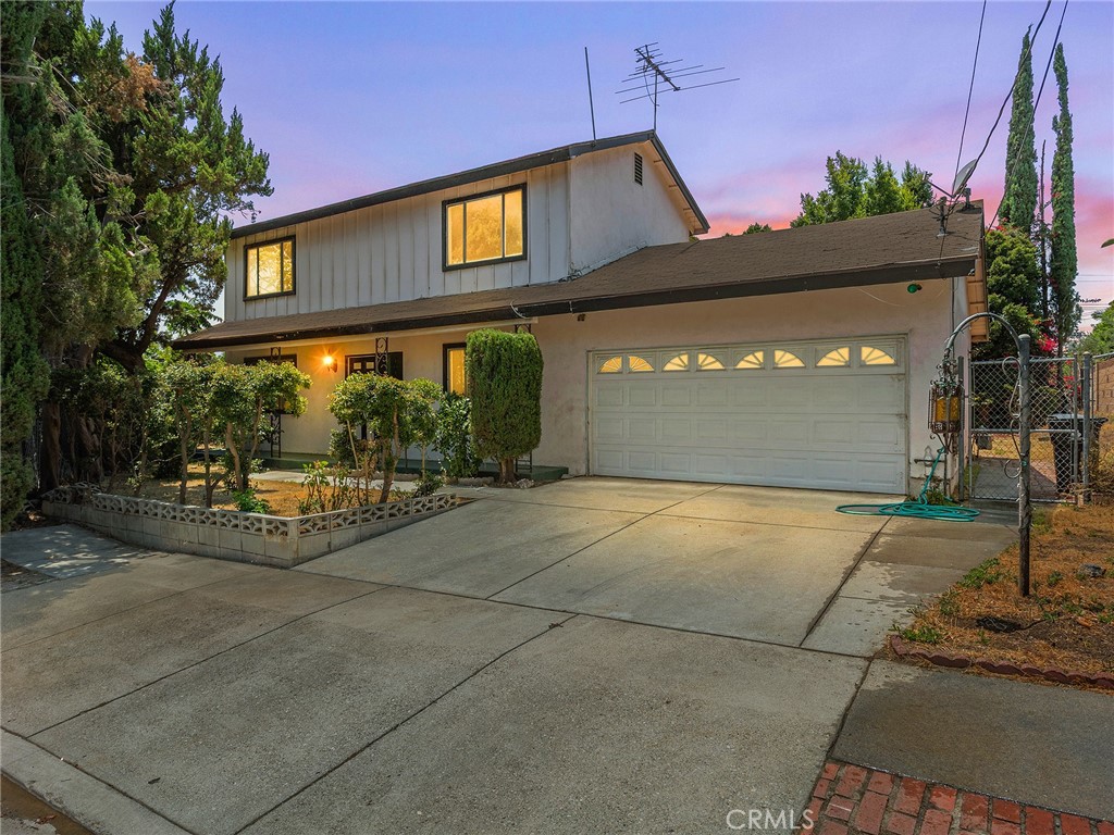 Nestled on a peaceful cul-de-sac, this charming home offers a spacious 6,080 square foot lot, providing ample outdoor space for relaxation or future expansion. The residence spans 1,548 square feet, featuring three generously-sized bedrooms and two bathrooms, perfect for both comfort and privacy. As you enter through the formal entryway, you're greeted by a welcoming atmosphere that flows seamlessly into the formal dining room, ideal for entertaining guests or enjoying family meals. The inviting living room is centered around a cozy fireplace, making it the perfect spot for unwinding on cooler evenings. An attached two-car garage provides convenience and includes a dedicated laundry area, adding to the home's functionality. Though in need of some TLC, this property presents an incredible opportunity to fix and save, allowing you to customize it to suit your unique taste and lifestyle.
