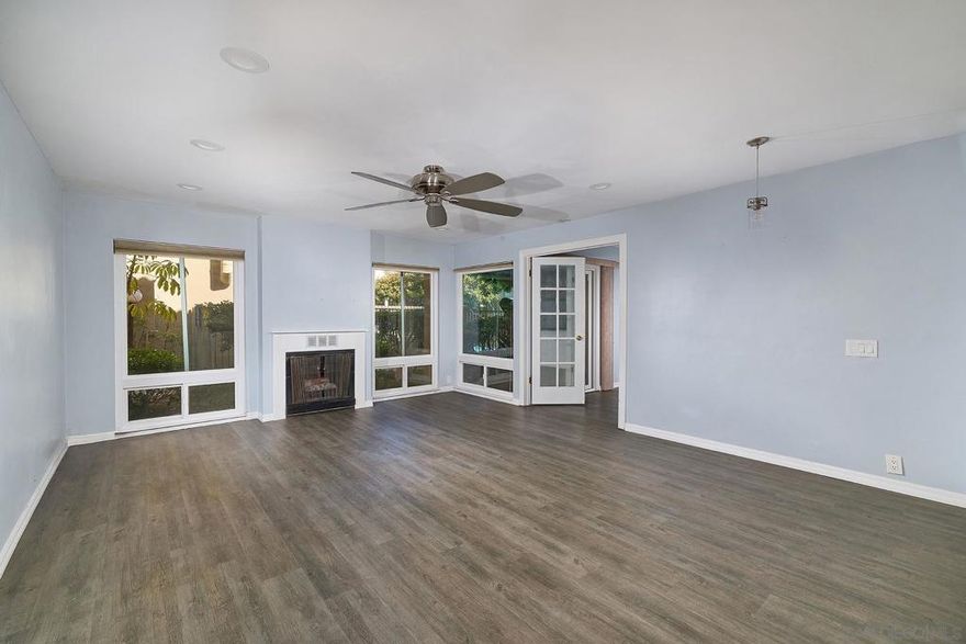 Coastal living in the heart of Pacific Beach.  This 2-bedroom / 2-bath condo is the perfect launching “pad” for enjoying life in the greater Beach Cities.  The kitchen is outfitted with a refrigerator, dishwasher, microwave oven, electric range, quartzite countertops, backsplash & newly installed garbage disposal.  Substantial electrical upgrades throughout: recessed lighting & a fireplace (both very rare for this complex), 3 ceiling fans, pendant lighting, electrical panel, fiber optic & cable ready, the installation of new outlets as well as dimmer switches.  The acoustic ceiling material has been removed & the radiant heat system has been replaced with the installation of 3 efficient wall heaters.  Luxury vinyl plank flooring throughout with the exception of primary bedroom #1.  Dual pane windows & a sliding glass door which opens to a private patio area.   French doors located between the living room & primary bedroom #2.  New vents & fans installed in each bathroom.  Crown molding throughout.   Entertainment system ready with interior wood mounts located above the fireplace.  Cabinet / shelving system in the closet of primary bedroom #2.  Exceedingly close proximity to the pool, hot tub & laundry rooms.  Centrally located & pedestrian friendly: walking distance to supermarkets, various merchants, restaurants, Mission Bay, Kate Sessions Park, & the beach.  This condo would be ideal as a primary residence, off campus living for university students as well as a second home with the potential for income producing capabilities.