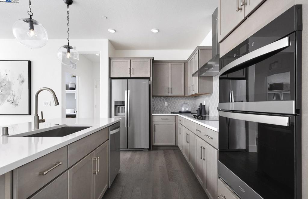 This Horizon plan is beautifully upgraded throughout & ready to move in August! Grey quartz countertops compliment the white cabinets in the gourmet kitchen. This popular floor plan also features two downstairs bedrooms with a full bathroom. *PHOTOS ARE OF MODEL HOME*