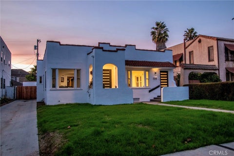 Photo of 1247 S. Tremaine Avenue, Los Angeles, CA 90019 (MLS # SR26203778)