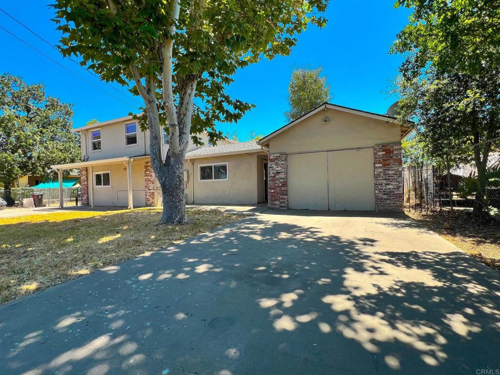 Dual Unit Dream! Live in One, Rent the Other! Welcome to 2150 Michael Avenue in Stockton, California—a rare and versatile opportunity featuring two fully separate units in one building. This unique setup makes it ideal for house hacking, multi-generational living, or as a smart investment property. Each unit has its own private entrance, kitchen, bathroom, parking and back yard, providing maximum flexibility and privacy. Whether you're a first-time buyer looking to offset your mortgage with rental income, an investor seeking a high-demand rental property, or a family needing separate living quarters, this property checks all the boxes. The layout is functional and efficient, with comfortable interiors, ample natural light, and comfortable living areas. Outside, you’ll find a private yard for each unit and plenty of parking. Each unit has its own gas, water, and electric meter. The bottom unit features 3 bedrooms, 1 bathroom, dining room, laminate flooring and private back yard and garage. The top unit has 2 bedrooms, 1 bathroom, AC, and a large back yard. Located in a quite neighborhood with easy access to schools, shopping, and major freeways, 2150 Michael Avenue offers both convenience and opportunity. This is your chance to own a property that not only provides a place to live, but also helps build long-term financial freedom.