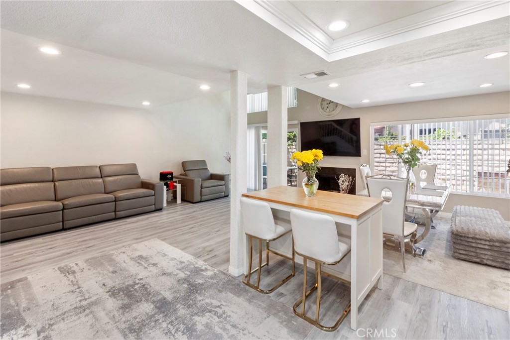 Motivated seller! Situated in the best pocket of Winnetka, an exceptionally quiet, clean, and sought-after neighborhood. Welcome to this beautifully updated 3-bedroom, 2.5-bathroom townhouse located in a well-maintained Winnetka community with a pool, spa, and convenient guest parking. The HOA taking excellent care of the common areas.
Inside, you’ll find an open-concept layout with upgraded flooring, vaulted ceilings, recessed lighting, and a sleek modern fireplace. The spacious kitchen features granite countertops, a tasteful stone backsplash, new stove and microwave, a movable center island, and plenty of cabinetry—offering both style and practicality. The home also includes new windows, doors, and a new water heater for added comfort and efficiency.
The bright living room opens to a private patio with a brand-new fence, creating the perfect space to relax or entertain.
Upstairs, the primary suite offers vaulted ceilings, a walk-in closet, a private balcony, and a fully remodeled bathroom with dual sinks, updated vanities, a soaking tub, and separate shower. The second bedroom enjoys its own fully renovated en-suite bathroom, while the third room serves perfectly as a guest bedroom or home office.
Ideally located within walking distance to Limerick Elementary School and just minutes from Topanga and Northridge malls.