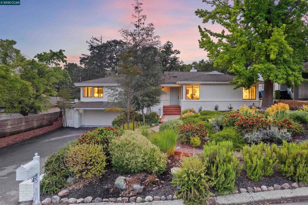 Timeless Elegance in Coveted Orinda Estates. Nestled in the highly sought-after Orinda Estates Neighborhood, this 5-bedroom 3.5 bath, light-filled 1948 residence seamlessly blends classic architecture with modern updates. Located on a quiet, circular street adjacent to the Orinda Country Club Golf Course, this expansive 3,593 sq ft home sits on a beautifully landscaped 0.34-acre lot, featuring a sparkling pool, private decks, & space beyond the back deck with potential for a flat yard. Thoughtfully designed for comfort and functionality, the main level of the home offers: 4 spacious bedrooms & 2 updated bathrooms, a brand-new kitchen with views of the pool, a large living room with vaulted ceiling, brick fireplace and wet bar, sun-drenched family room with artisan plastered fireplace & views of the Orinda hills. Gleaming hardwood floors and fresh interior paint plus a large laundry room & powder bath aim up this level! The flexible lower level is perfect for a 5th bed, home office, 2nd family room, or in-law suite with access to the attached 2-car garage, side patio and separate storage room. Enjoy the convenient location, just minutes from Hwy 24, BART, and scenic walking & biking trails to downtown Orinda & award-winning Orinda schools, including Wagner Ranch Elementary.