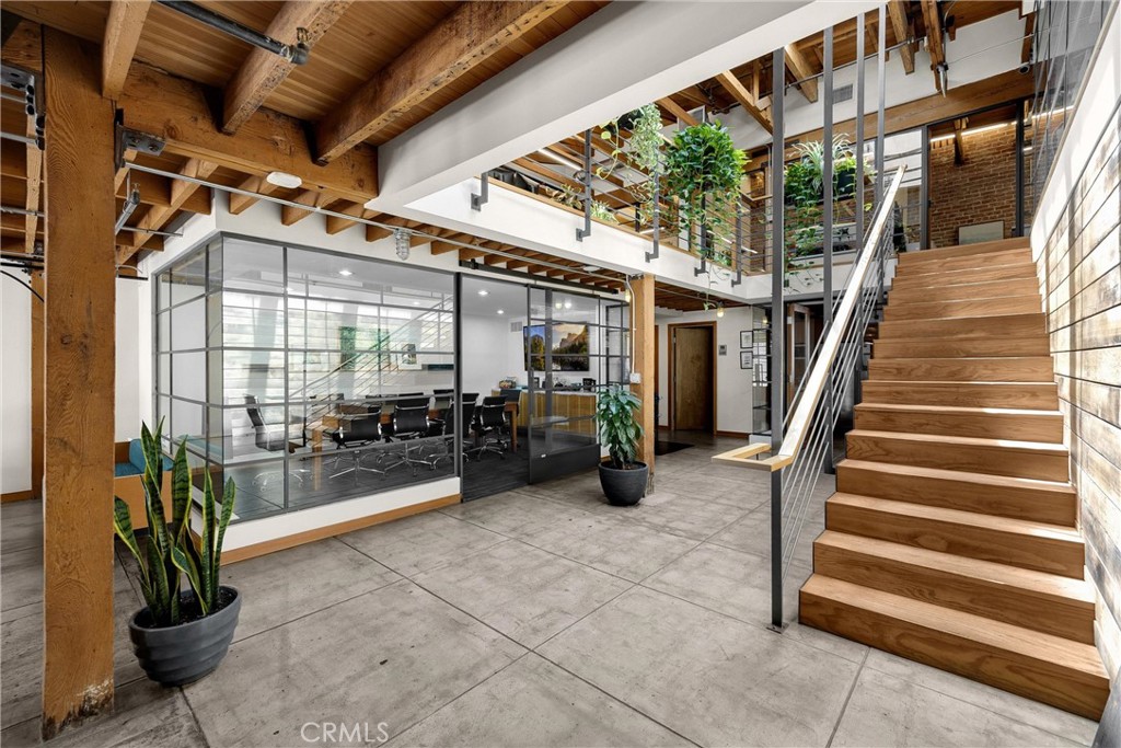 We are proud to present an extraordinary loft-style office space that redefines modern sophistication. Perfectly situated in the heart of Downtown Long Beach’s vibrant Arts District, this one-of-a-kind property blends historic local charm with contemporary design.
From the moment you step inside, you’re greeted by striking architectural details — soaring ceilings, exposed brick walls, sleek cement floors, and expansive floor-to-ceiling glass that floods the interior with natural light. Every corner of this office exudes style, energy, and inspiration.
The layout has been thoughtfully designed to balance privacy and collaboration. Featuring 8 private office suites, several open office spaces, spacious conference room, recently upgraded grand open-concept kitchen, welcoming front reception, and two well-appointed restrooms, this property provides both functionality and elegance. A dedicated private space further enhances its versatility, making it ideal for dynamic teams and creative professionals.
425 E. 4th E. Street isn’t just an office — it’s a statement. A place where innovation meets sophistication, designed to impress clients and energize your team.
The recent improvements to this space are both extensive and value-enhancing. For additional information or to arrange a detailed discussion, please contact the listing broker.