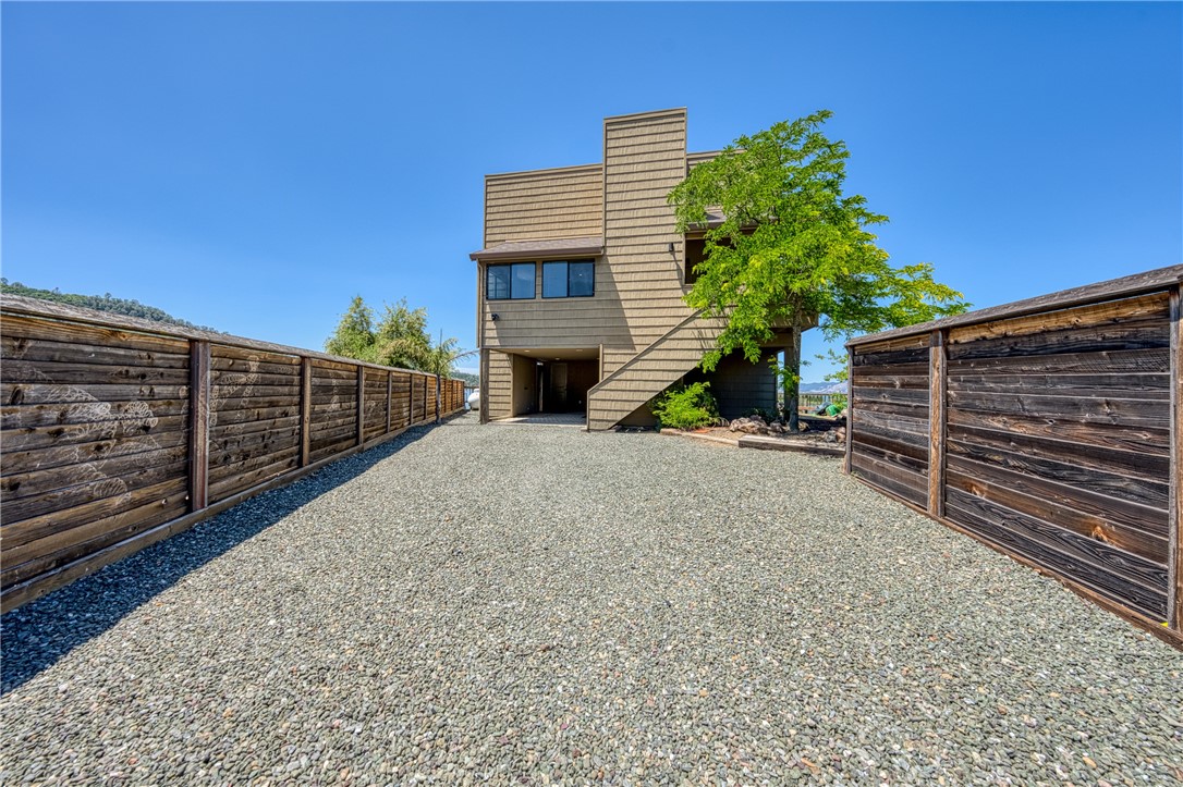 Beautiful Lakefront property- This property has it all: Views, Views And more views. private boat dock with electric lift. Nicely appointed kitchen. A great deck off Living Room and a covered patio to enjoy the beautiful sunsets. You as the proud new owner can keep it in the VRBO program for substantial income and block out days or weeks for your personal use. Or move in and enjoy the Resort lifestyle 24/7. Boating, Fishing, Kayaking, Wave runners, Bring all your toys. The home is nicely and completely furnished - the contents of home are available for purchase, totally negotiable. Newer AC unit for those hot summer days and a cozy fireplace for those cool winter months .