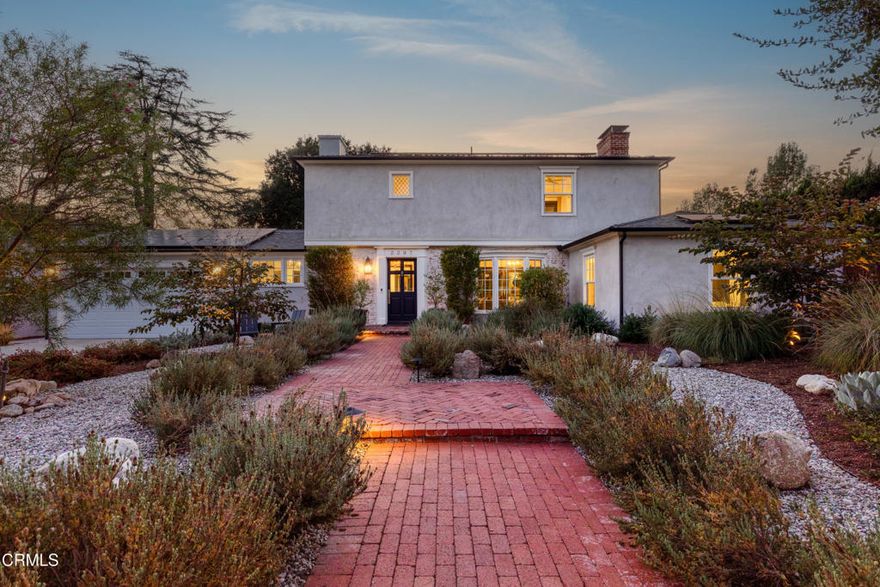 Situated on the bank of Hahamongna Watershed Park, this exceptional property offers a rare blend of natural beauty, privacy, and refined living. Nestled among mature oaks on the coveted Upper Arroyo Seco loop, the home enjoys an idyllic setting with direct connection to Pasadena's most scenic trails and landscapes.The front garden was recently reimagined by Native Gardens landscape architects and now features a striking collection of drought-tolerant plantings, thoughtfully designed for year-round appeal. The backyard is equally impressive with a sparkling updated pool, fire pit, and a covered patio ideal for dining in nature--all surrounded by tree-filled vistas and mountain views that provide both tranquility and seclusion.Inside, the home has been extensively updated with an emphasis on craftsmanship and comfort. The custom kitchen is a true centerpiece, boasting a full suite of Thermador appliances, including dual ovens, as well as custom cabinetry and a spacious island designed for both entertaining and exceptional storage. The open layout encourages effortless gathering and connection.The first level offers two well-sized bedrooms and a chicly updated bathroom, complete with patterned concrete tile flooring and a marble double-sink vanity. A convenient laundry area and a pool bathroom off the covered patio add thoughtful functionality.Ascending the staircase with its hand-wrought iron railing, the primary suite occupies the entire upper level. This serene retreat includes a fireplace-centered bedroom with doors that open to a private deck, an enormous walk-in closet, and a spa-like bathroom elegantly appointed with refined finishes. A second laundry area upstairs adds to the ease of daily living.Perfectly located on Pasadena's desirable west side, this property combines modern luxury with the timeless beauty of its natural surroundings--an extraordinary place to call home.