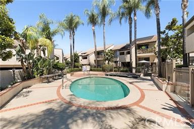 This light and bright unit has a prime location in the back of the complex away from the street and a beautiful view of the pool from the spacious front patio. New tenants will enjoy two bedrooms, two baths, an airy living room with cathedral ceilings, dining area and open kitchen that overlooks the living area and dining area. The primary bedroom has a large closet and views of the trees from the balcony that lead to old town Calabasas. The attached primary bath has a tiled floor and step in shower. Guest bath has a full size tub with shower. Included in the rent is a washer and dryer located in the secondary bedroom closet. This rare unit has a spacious flat artificial grass patio great for a play area or outdoor entertaining. HOA amenities include water, trash pick up and access to the community pool and spa. The locked gate in the back provides entry to the Calabasas Farmers Market on Saturday mornings and Old Town shops and restaurants. Stroll the peaceful private Calabasas Lake with 2 resident passes. Also included is 2 tandem parking spaces in a secure underground garage as well as 2 storage units. Located in the award winning Las Virgenes School District, you can't go wrong!