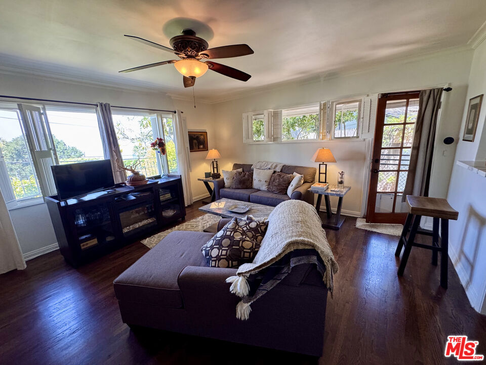 FULLY FURNISHED. SHORT TERM POSSIBLE. Cozy Furnished 2-Bedroom Lease in Prime Hollywood Hills! Located on quiet, desirable Torreyson Drive in the Hollywood Hills (90046), this private, fully furnished 2-bedroom, 1-bath section of the a single family home offers comfort, charm, and independence with a separate gated entrance. Step inside to a bright and welcoming living space with hardwood floors and abundant natural light filtering through classic shuttered windows. The two bedrooms are tastefully appointed with a queen-size beds dressed in elegant bedding .The spacious bathroom features a double-sink vanity, a large walk-in shower with a built-in bench, elegant travertine-style tile, and a separate toilet room.The kitchen is fully equipped with cookware, essentials, and a unique integrated dishwasher system built directly into the sink a space-saving, modern feature rarely found in rentals.Additional conveniences include a stacked washer and dryer in the bathroom, plenty of closet space / pantry space. Traditional decor, framed art, and comfortable furnishings create a warm, homey atmosphere, perfect for short or long-term living. Close to Universal City, Stdio City, Hollwyood, West Hollywood and 101 freeway, this hillside retreat is agreat to call home. Street Parking only.