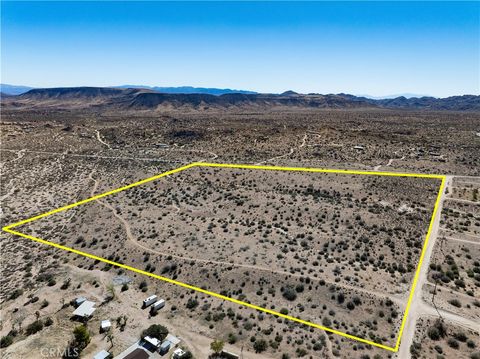 Photo of 0 Pipes Canyon Road, Pioneertown, CA 92268 (MLS # JT25242906)