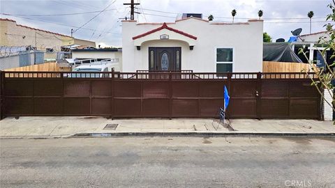 Photo of 426 W 63rd Pl, Los Angeles, CA 90003 (MLS # DW25269766)
