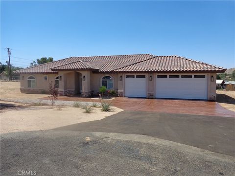 Photo of 18255 Winnetka Rd, Apple Valley, CA 92307 (MLS # CV26064597)