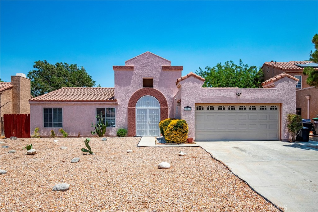 This charming single-level home is nestled in a prime location near modern amenities and offers 3 bedrooms and 2 bathrooms with over 1,410 sq. ft.—blending practicality and potential for those ready to create a space of their own. Situated in a vibrant neighborhood near schools, shopping centers, and essential services, it’s perfect for anyone seeking convenience with room to grow.
Step outside to the true highlight—an exceptionally large backyard full of possibilities. Whether you envision a garden, outdoor entertaining area, play space, or even an ADU, this expansive lot is ready for your vision. Low-maintenance landscaping adds ease, while full fencing offers privacy and peace of mind for both relaxing afternoons and lively gatherings.
Inside, sunlight fills the living room, showcasing a charming tile fireplace that adds a cozy touch. The kitchen features a breakfast bar and a casual dining area—an ideal starting point for a custom remodel. Adjacent to the kitchen, a spacious living area offers flexibility as a family room, playroom, or media space.
All three bedrooms offer unique options for personalization. The primary suite includes its en-suite bathroom and a generously sized closet, while the two additional bedrooms are great for guests, home offices, or creative uses.
The front yard features desert landscaping for easy upkeep, and the driveway leads to an attached garage—perfect for storage, a workshop, or a home gym.
Beyond its features, the home’s unbeatable location and oversized lot offer a rare opportunity for homeowners or investors alike. More than just a house, it’s a blank canvas—a place where future memories and possibilities can thrive.