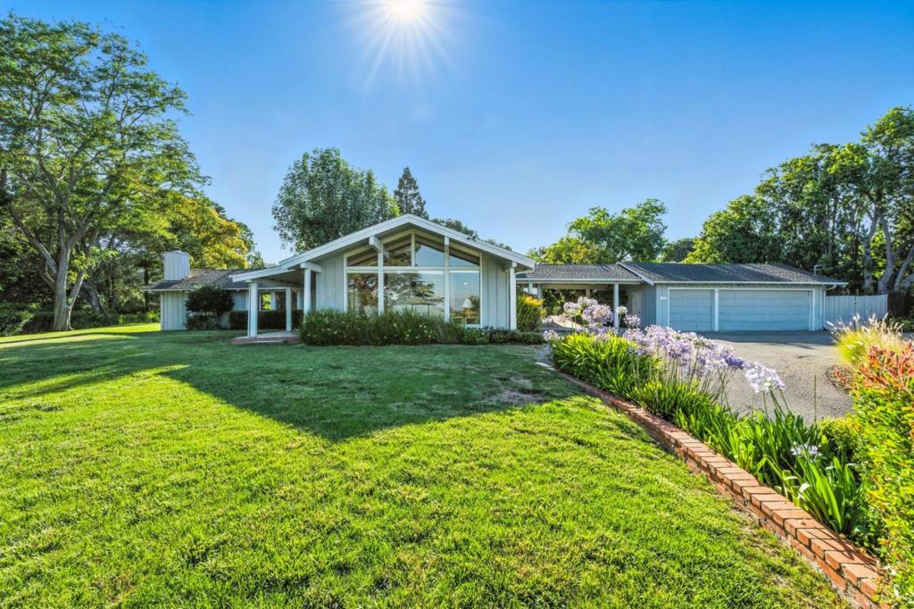This spacious home is situated on a truly irresistible lot with over an acre of private, tranquil grounds surrounded by picturesque bay and mountain views. A 3-car garage and sparkling pool complete the property, creating a serene escape without sacrificing proximity to everything Silicon Valley has to offer. Four bedrooms with four and a half baths offers a footprint for a remodel or create a custom build for a showpiece in the valley.