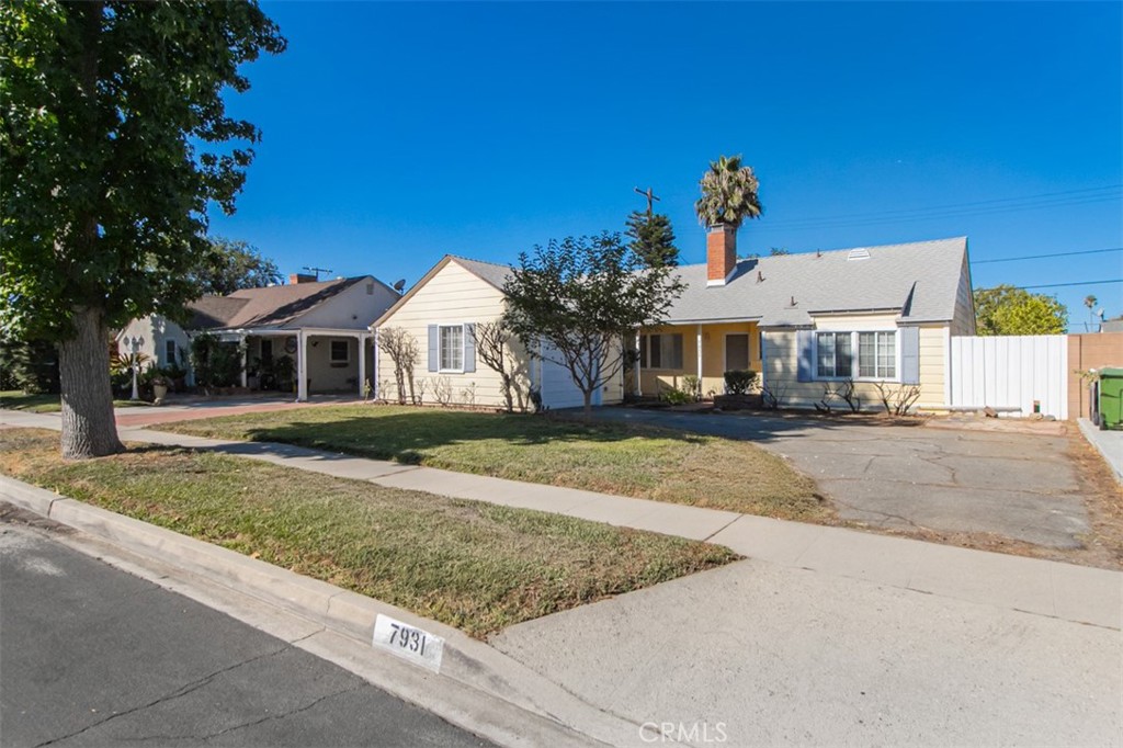 Welcome to this incredibly charming and inviting warm home upgraded with contemporary style and detail. This one-story open floor plan offers 3 bedrooms and 1 spacious bathroom with separate tub and shower. The living room offers a floor to ceiling fireplace with custom mantle, built-in cabinets and an adjoining dining area. It features a wall of oversized windows to enjoy lots of natural light and a lovely view of the serene backyard with a covered porch, large patio & grassy play areas and fruit trees. Enjoy cooking and entertaining in an absolutely gorgeous kitchen with newer cabinetry, granite counters, custom backsplash, sitting bar, premium hardware & lighting. Other amenities include recessed lighting & crown molding, tank-less water heater, copper plumbing, newer roof & A/C unit.