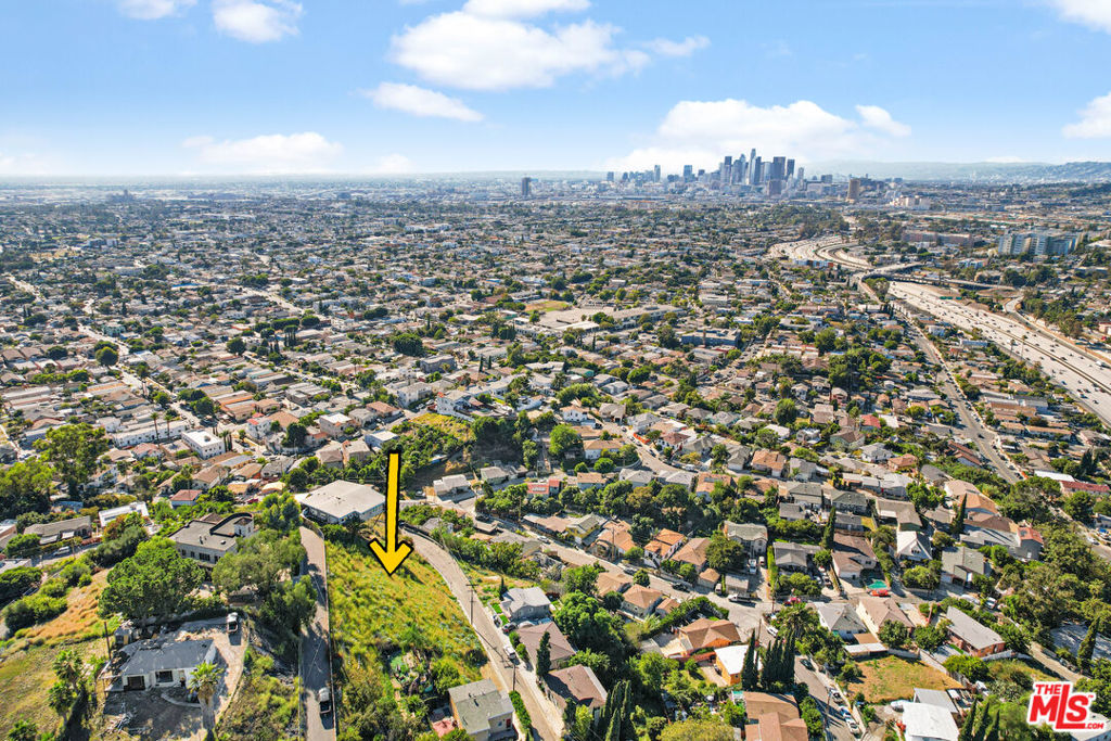Opportunity Awaits at 1229 Dodds Circle Prime View Lot in City Terrace, Los Angeles. We are pleased to present 1229 Dodds Circle, a rare and exceptional view lot nestled in the vibrant City Terrace neighborhood of Los Angeles County. This 4,969 sqft street-to-street parcel offers dual paved access from both Dodds Circle and Hicks Avenue, presenting a unique opportunity for a private party to build their dream home or for a developer to create a standout spec residence. Perfectly suited for a primary residence with the potential to add an Accessory Dwelling Unit (ADU) featuring separate and private access, this lot offers versatility and privacy. The proximity to California State University-Los Angeles opens possibilities for student housing or investment income. Situated in the heart of the rapidly rising East Los Angeles market, this location boasts irreplaceable panoramic Downtown Los Angeles views and scenic hillside surroundings. City Terrace is fast emerging as one of the most sought-after residential enclaves in Los Angeles, thanks to its prime access to freeways, abundant employment opportunities in Downtown LA, and close proximity to key institutions like California State University-Los Angeles and USC Keck Medical Center. With ongoing gentrification and an influx of young professionals, 1229 Dodds Circle stands as an unmatched opportunity to invest in a community on the rise a true gem for visionary homeowners or developers alike.