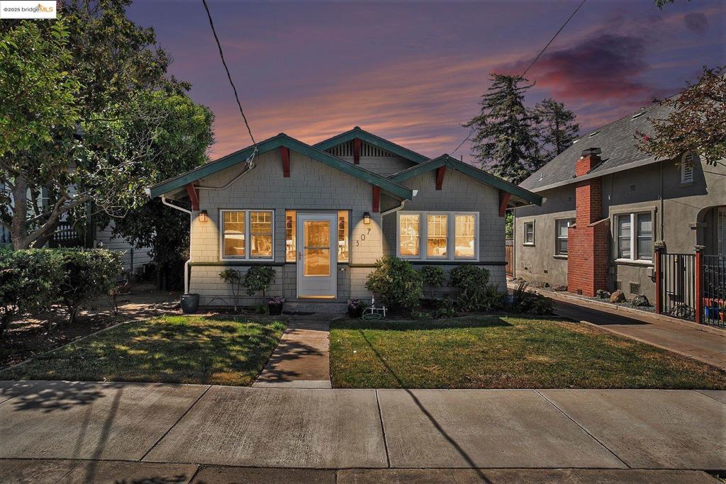 Charming Downtown Craftsman with Classic Details & Modern Upgrades! Offered for the first time in decades, this darling Craftsman has been lovingly owned by the same family since 1940. Bursting with character, it features original built-ins—including a vintage Murphy bed and a charming closed-in front porch, perfect for morning coffee or a quiet read. Major upgrades have been completed, including foundation, electrical, and plumbing. Ideally located to the vibrant new downtown shops and the bustling Sunday Farmers Market. The quaint backyard offers a peaceful retreat, highlighted by automatic sprinklers and a mature orange tree that the seller confidently claims produces the city’s finest oranges. Bonus feature: a rare stand-up basement—perfect for storage, easy access for future upgrades or repairs, or even that wine cellar you've been wanting. A unique opportunity to own a piece of local history with modern peace of mind. Views: Downtown