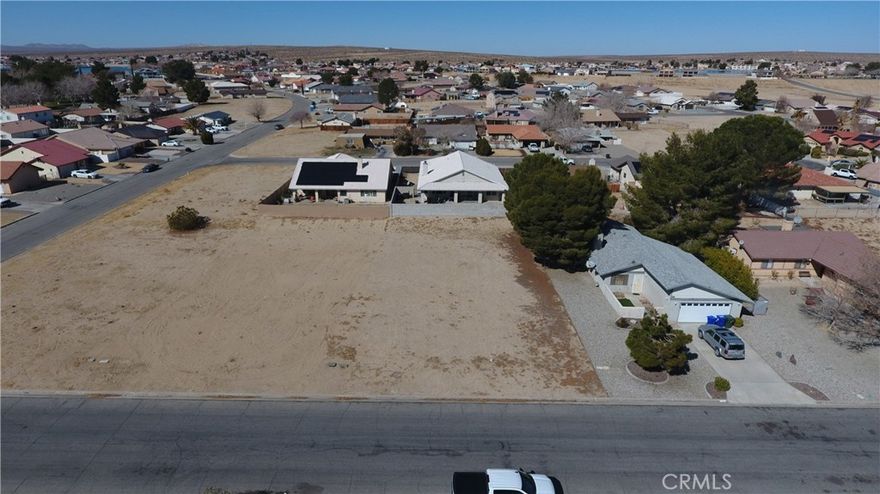 Discover the perfect canvas for your dream home in the highly sought-after Silver Lakes community of Helendale! This prime, flat lot is ready for you to build, with utilities nearby and easy access on a paved road. Nestled in the serene Mojave River Valley between Victorville and Barstow, Silver Lakes offers a unique blend of tranquility and recreation with low monthly HOA dues.

Enjoy an array of resort-style amenities, including a 27-hole championship golf course, two private lakes for fishing, swimming, and boating, plus a beach and boat launch. Stay active with tennis, pickleball, and bocce ball courts, an Olympic-sized swimming pool, a 24-hour gym, and equestrian facilities. The clubhouse, library, RV park, and community events create a welcoming environment for all ages.

With breathtaking views of the San Bernardino Mountains and the shimmering lakes, this lot presents an incredible opportunity to build your custom retreat in a thriving and picturesque community. Don’t miss out—schedule a visit today and start turning your vision into reality!