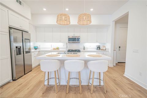 Photo of 27212 Diamond Peak Lane #203, Valencia, CA 91381 (MLS # SR26082792)