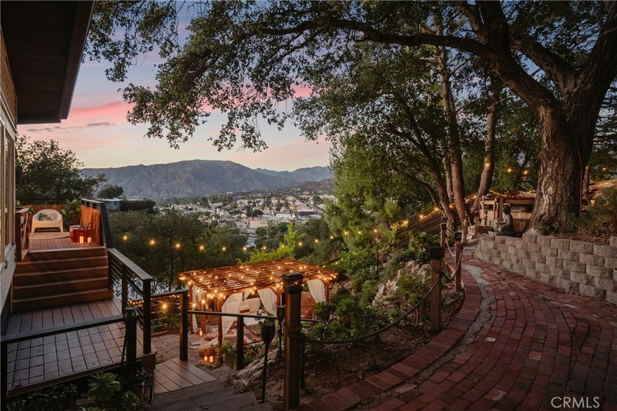 Elevated living above the foothills—9570 Amoret Drive is a fully reimagined modern retreat with sweeping mountain and valley vistas, effortless indoor-outdoor flow, and a rare new ADU for income or multi-gen flexibility. Beyond the walls of glass and designer finishes, the substance is turnkey: copper plumbing, upgraded electrical panel, newer central A/C, and thoughtful updates throughout. The main level blends a quartz-wrapped chef’s kitchen, sunlit living and dining, and view-forward decks for golden-hour entertaining; the restful bedroom wing is paired with spa-caliber baths. A new ADU with private entry expands the way you live—guest suite, creative studio, or premium rental. Terraced gardens and multiple patios create distinct zones for morning coffee, open-air dinners, and stargazing.

The interiors honor their mid-century heritage with walls of glass that frame sweeping valley vistas, while refined updates bring a sense of ease and modernity — a quartz-wrapped chef’s kitchen anchors the heart of the home, soaring ceilings invite openness, and a newly designed bedroom retreat with a spa-like en suite bath elevates everyday living. 

A guest suite below for visiting family, a studio for creativity, or a sanctuary for extended living. It’s a home that evolves with you, supporting both community and solitude.  Solar panels are fully paid off, providing the buyer with added value through ongoing energy savings and an environmentally conscious lifestyle.

Set across more than a quarter acre, this residence is more than an address. It is a lifestyle — a fusion of Los Angeles sophistication and hillside zen, a retreat in the clouds for those who seek balance, inspiration, and a daily reminder that beauty can be both grounding and transcendent.  Property has been throughly upgraded, too many to list.  Solar is paid off!