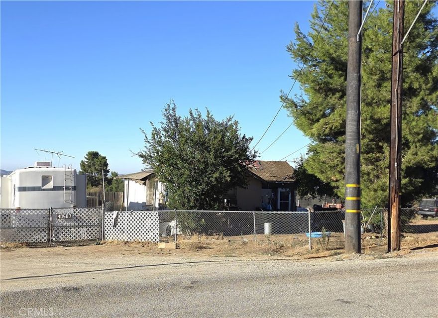 A dream investor opportunity or a builder's dream opportunity on this view lot! Just shy of a full acres, .92 acres (40,075) total sq. ft. of "flat" land. Home on lot is a "tear down" or could be considered a "remodeled" if leaving one wall up and build around it. Plenty of land to build your custom home or units! All utilities are in, electrical, gas, water. Septic tank on property. Great area of Cherry Valley! ... Highly sought after neighborhood!