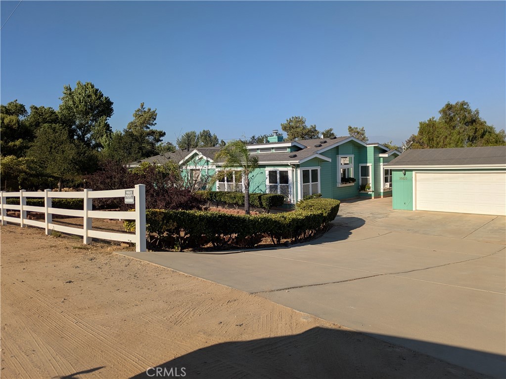 INVESTMENT OPPORTUNITY !! ATTENTION DEVELOPERS !! MURRIETA near shopping at Costco, Vista Murrieta High School and EZ Access to Hwy 215.
2.07 ACRES in the HEART of current developments of Multi-Family Dwellings! LOCATION, LOCATION, LOCATION! JUST OFF THE CORNER, WITH A NEW TRAFFIC SIGNAL, ON THE EXPANDED CLINTON KEITH ROAD. 1 LOT North FROM CORNER OF ARENDT LANE X CLINTON KEITH. BETWEEN SIGNALS AT WHITEWOOD AND MENIFEE RD. New Developments all around the area in progress and in Murrieta Planning Dept awaiting approval. Current Developer nearby will be paving the street directly in front of this property. There is a Custom Home on the property that could be lived in or used for Construction Office ? or Rental ? Or ?, while you are in Planning. Don't let this one get away from you!! NEARBY PROPERTIES ALSO AVAILABLE. Currently zoned RO2, for 6-10 Units per ac