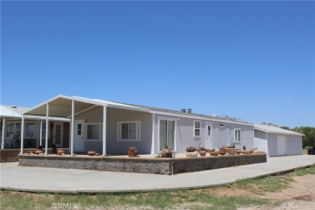 *** LOWEST PRICED HOUSE IN HIDDEN VALLEY, HURRY!!!*** Here is your chance to get your river house in the premier resort of Hidden Valley with lagoon and partial river view. Opportunity is knocking, so bring your paint brush and some elbow grease to make this your very own river house paradise. This is a 2 bedroom with a den that can easily accommodate a pull out sofa for a third sleeping area. Large garage with side pull up door to store all the river toys! Super easy to maintain because this house is completely surrounded with concrete... no yard work!! The garage has a built in drywalled and air conditioned room for a dream workshop, office or additional accommodations. Can you imagine yourself BBQing on the front covered porch drinking in the beautiful lagoon and river view? This house will go quick, this is the opportunity you have been waiting for!