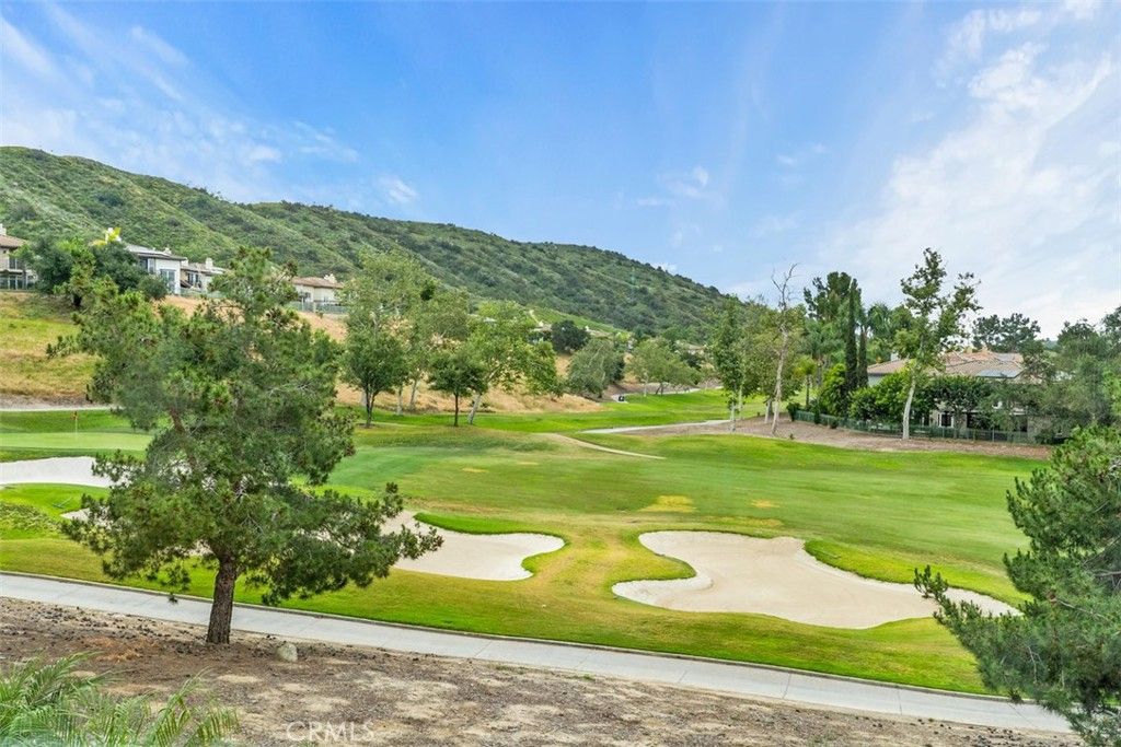 Photo of 66 Foxtail Ln, Rancho Santa Margarita, CA 92679 (MLS # OC26072117)