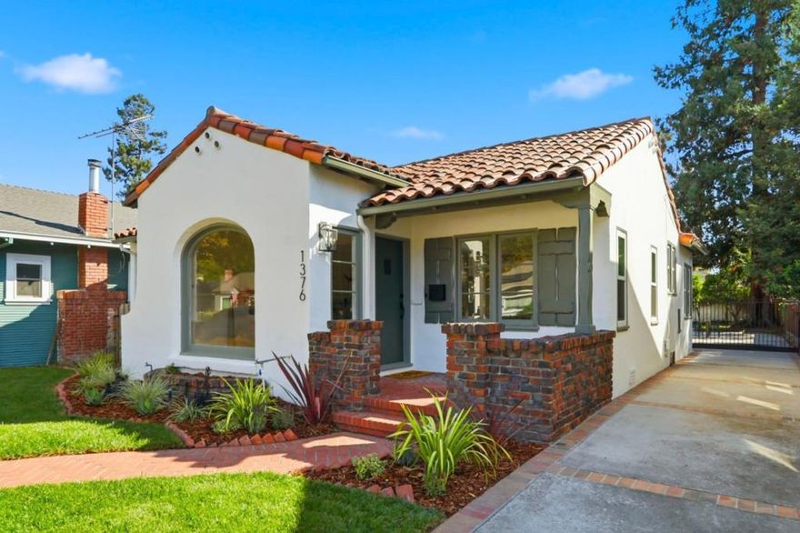 Charming Spanish Revival nestled in historic Shasta-Hanchett Park neighborhood of San Jose. This updated home combines timeless architecture with modern comforts, making it a true gem in a vibrant community. Spacious living room features an arched picture window and classic tiled fireplace. The renovated kitchen is equipped with stainless steel appliances, new cabinetry, quartz countertops, and a tiled backsplash. The dining room, with its built-ins and inviting windowed space, is perfect for family gatherings and entertaining. This home offers three spacious bedrooms, a new half bath, and a classic hall bathroom, all thoughtfully designed to provide comfort and style. The interior is bathed in natural light and offers a mix of hardwood and tile floors, complemented by new light fixtures and central heating. There is a finished oversized two-car garage comes with an attached workshop and laundry room, and a basement. Step outside to the serene back yard, perfect for relaxation and entertaining, and enhanced home curb appeal with its lush lawn and brick front porch. Located near the San Jose Municipal Rose Garden, and Alameda corridor with a delightful mix of cafes, restaurants, and shops, adding lifestyle appeal to this highly desirable, well-connected neighborhood.