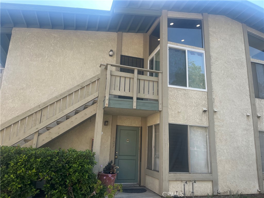 This unit is an extensively updated and remodeled second-level, 2-bedroom, 2-bathroom condo in the gated Countrywood Community in Colton. The renovation has just been completed, featuring new double-pane windows, freshly painted throughout, including the smooth ceiling (no popcorn), a new all-inclusive kitchen with new stainless steel appliances, new cabinets, new stone countertops, and installed lighting. Bathrooms that are like showpieces. Even all the electrical sockets and switches are new. Convenient features include a spacious living room, a dining area off the kitchen, a stackable laundry room, a walk-in closet, one assigned covered parking space, and additional parking for guests. HOA fees cover water, trash, exterior landscaping, pool, and spa. It is conveniently situated near shopping, dining, and Loma Linda and VA medical facilities, and has easy access to freeways 215, 10, and 91.