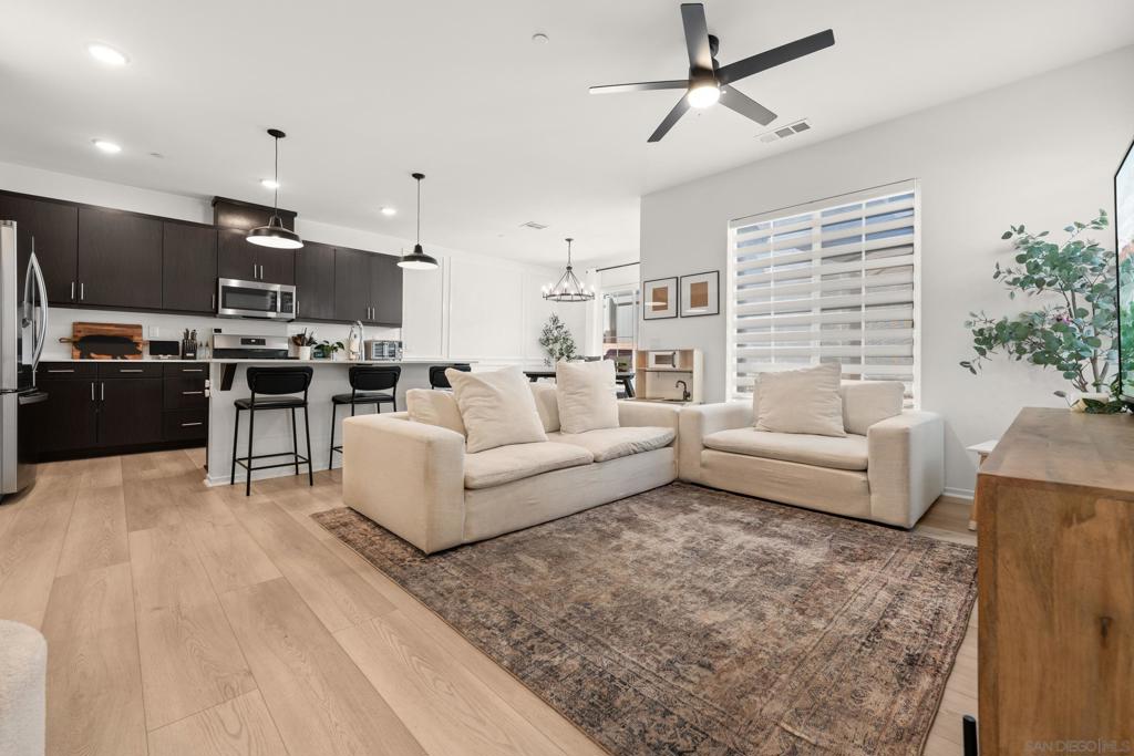 Welcome to Citro! Excited to share the Plan 3, which is the largest model in the Zutano community! This modern home features an open floor plan, spacious kitchen/living area, and downstairs powder room—perfect for entertaining. The oversized primary suite offers a walk-in closet, dual sinks, soaking tub, and walk-in shower. Upstairs also includes 3 secondary bedrooms and a full bath. Enjoy smart home tech and solar. Community amenities include a pool/spa, clubhouse, dog park, citrus groves, and 14 miles of trails. Easy access to 15 & 76 freeways and just a short drive to beaches, dining, and shopping! Come see what Citro has to offer you!