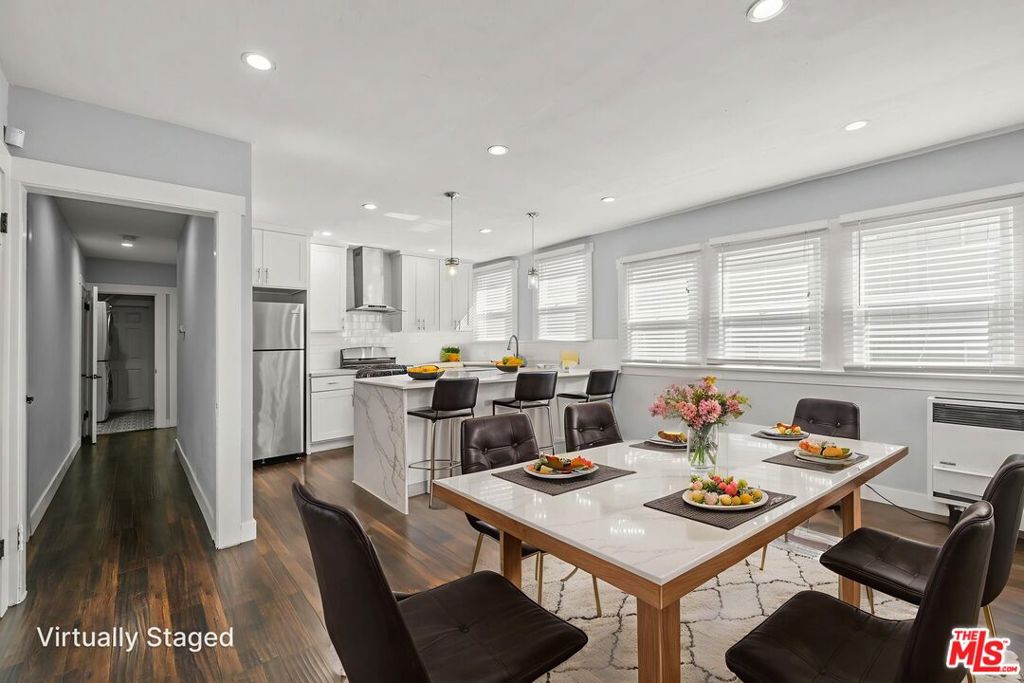 ** PET FRIENDLY ** WASHER/DRYER ** CENTRAL A/C ** FLAT UNIT ** ASSIGNED PARKING ** NATURAL LIGHT ** Welcome to 1754 N La Brea Avenue, where classic Spanish charm meets modern luxury in the heart of Hollywood! This recently remodeled 1-bedroom, 1-bath apartment is part of a beautifully restored Spanish-style building that perfectly blends vintage architecture with contemporary finishes. Step inside and instantly feel at home in a bright, open space filled with tons of natural light streaming through large windows. The living area features refinished hardwood floors, fresh designer paint, and elegant details that maintain the building's original character. The modern kitchen comes fully equipped with stainless steel appliances, including a refrigerator, range, and microwave, complemented by sleek cabinetry and stylish tilework that adds a touch of warmth and authenticity. The bedroom is spacious and inviting, offering plenty of storage and a relaxing atmosphere to unwind after a busy day in the city. The updated bathroom features beautiful Spanish-style tile, modern fixtures, and an overall spa-like feel. Additional perks include an in-unit washer and dryer, gated parking for one car, and a pet-friendly policy because your furry companion deserves to enjoy your new home, too! Beyond the unit, you'll love the unbeatable location in the heart of Hollywood. Just steps from Runyon Canyon, you can start your mornings with a scenic hike and end your evenings exploring the Hollywood Walk of Fame, the Hollywood Bowl, or the countless restaurants, bars, and cafes nearby. You're also just a quick 5-minute drive to Universal Studios and have easy access to the 101 Freeway, making commuting around Los Angeles a breeze. Plus, with grocery stores, gyms, and local boutiques just around the corner, everything you need is right at your doorstep. Experience the perfect mix of vintage charm, modern comfort, and prime location. 1754 N La Brea Ave is more than just an apartment; it's your gateway to classic Hollywood living!