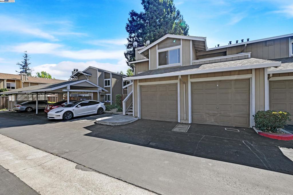 Charming 2-Bedroom Condo with Bonus Space & Great Value! Welcome to this spacious and inviting 2-bedroom, 1-bath condo offering nearly 1,200 square feet of comfortable living space—and the potential to make the formal dining into a 3rd bedroom! Located in a well-maintained community, this home features a desirable open-concept layout, perfect for modern living and entertaining. Step inside to find brand new windows that flood the space with natural light, along with fresh new carpet in the bedrooms. The cozy fireplace in the living room creates a warm, welcoming vibe, ideal for relaxing evenings or gathering with friends. Enjoy the convenience of an attached 1-car garage and appreciate the thoughtful floor plan that maximizes space and functionality. With just a few updates, this home offers incredible potential—perfect for first-time buyers, downsizers, or savvy investors. Don’t miss this opportunity to own a move-in-ready condo at a great price in a growing area! Just steps to Mia's Dream Come True Park!